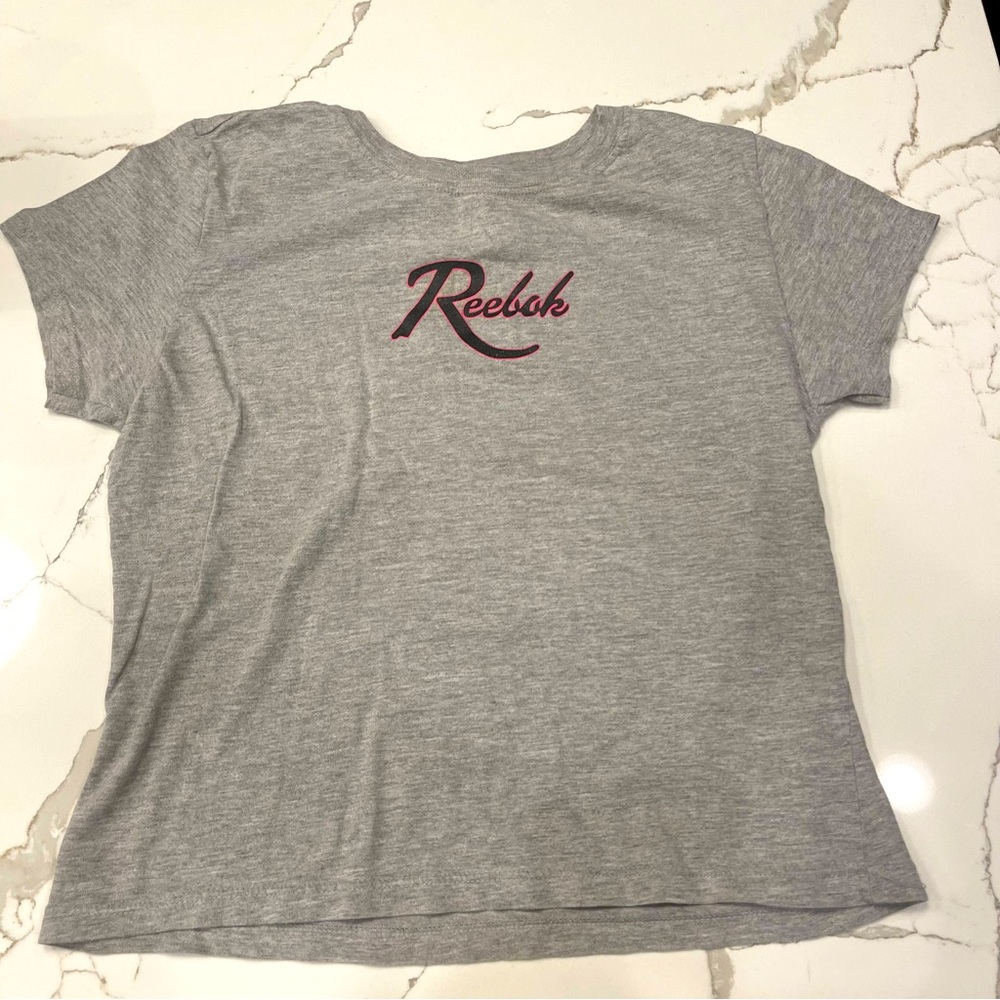 Women’s Reebok T-Shirt size Large in gray.
